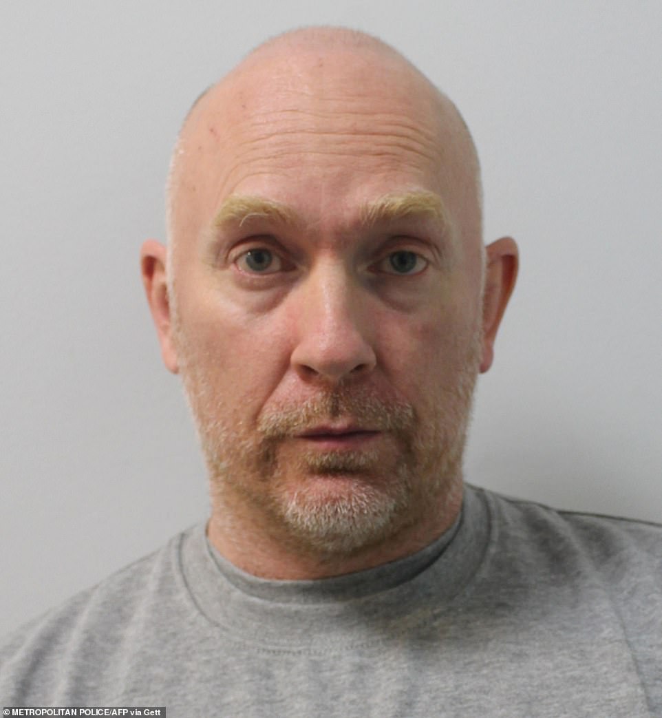 bald headed man with beard, 48 years old in headshot